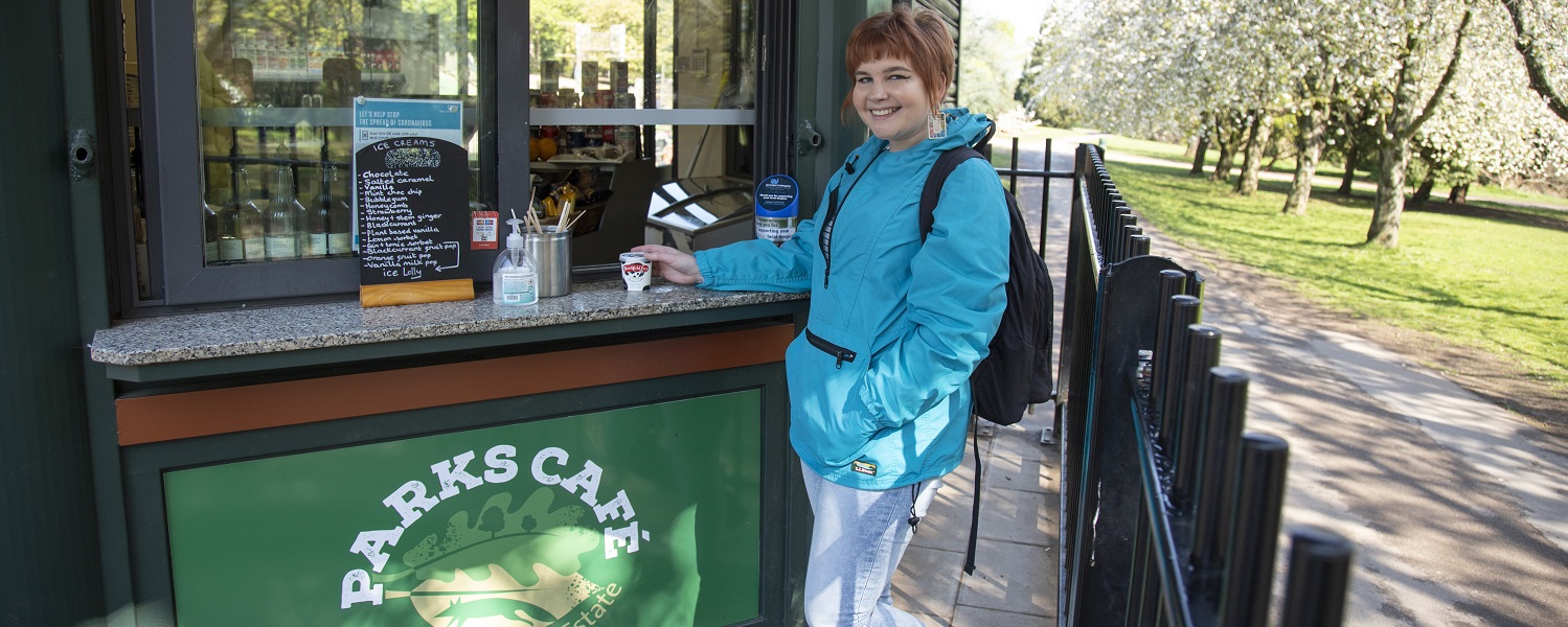 A woman outside the cafe