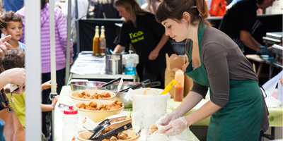 A lady serving in a market place